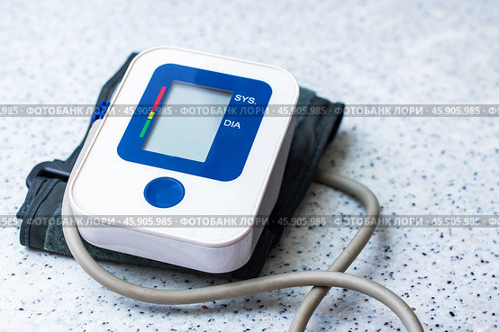 Digital Blood Pressure Monitor specifically designed for home use and personal health management. Стоковое фото, фотограф Аксенова Вера / Фотобанк Лори
