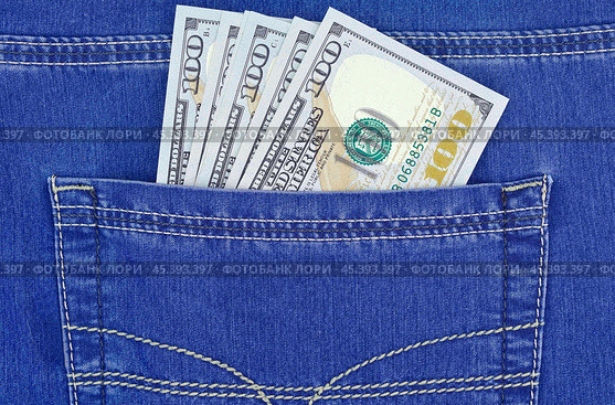 Доллары в кармане джинсов. Dollars bills in jeans pocket close-up. Стоковое фото, фотограф Татьяна Д / Фотобанк Лори