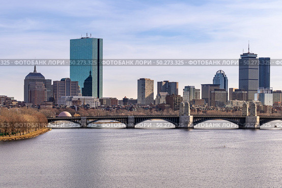 Downtown Cityscape of Boston skyscraper skylines office buildings along Charles River at Boston City Commonwealth of Massachusetts in New England United States. Photographing from Cambridge Side. Стоковое фото, агентство Ingram Publishing / Фотобанк Лори