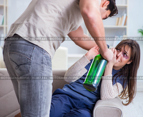 Drunk husband abusing wife in domestic violence concept. Стоковое фото, фотограф Elnur / Фотобанк Лори
