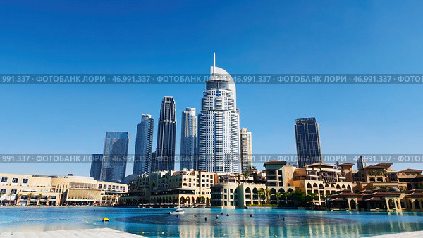 Dubai - United Arab Emirates, January 23, 2023: Panoramic view of Downtown Dubai with Address Downtown Hotel. Редакционное фото, фотограф David Kashakhi / Фотобанк Лори