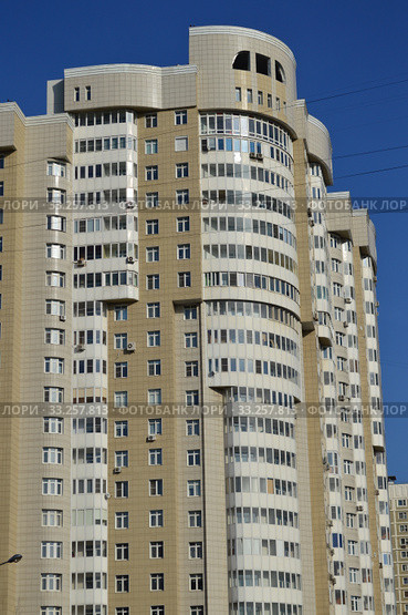 Двадцатипятиэтажный трехподъездный монолитный жилой дом, 2008 года постройки. Жилой комплекс «Воронцовский посад». Улица Яблочкова, 16. Бутырский район. Город Москва (2015 год). Редакционное фото, фотограф lana1501 / Фотобанк Лори