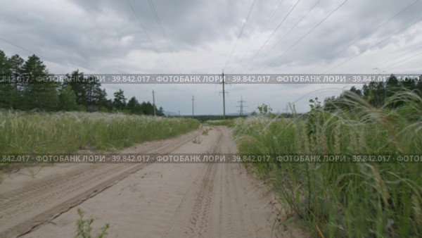 Движение по загородной грунтовой дороге. Стоковое видео, видеограф ALEXEY DUSHKIN / Фотобанк Лори