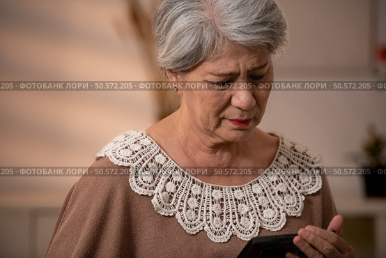 Elderly woman and lonely moments. Стоковое фото, агентство Ingram Publishing / Фотобанк Лори