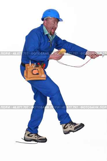 electrician having an accident. Стоковое фото, агентство Ingram Publishing / Фотобанк Лори