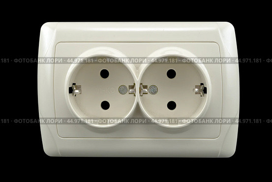 Электрические розетки на черном фоне. Electrical socket on an isolated black background. Стоковое фото, фотограф Татьяна Д / Фотобанк Лори