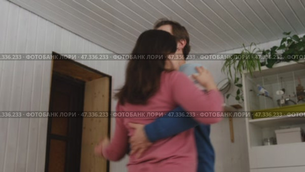 Emotional Dance. Middle-aged Couple Dancing Together Embrace at Home. Mature Couple dancing bonding, smiling and moving to the rhythm in a romantic vibe enjoying their anniversary. Active relationship. Стоковое видео, видеограф Марина Демидюк / Фотобанк Лори