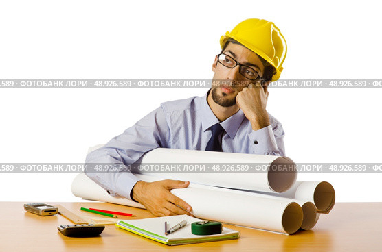 Engineer working with drawings on white. Стоковое фото, агентство Ingram Publishing / Фотобанк Лори