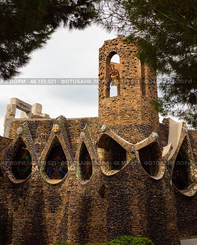 Exterior view of guell crypt, masterpiece gaudi architecture located at catalunya outside town. Стоковое фото, фотограф Яков Филимонов / Фотобанк Лори