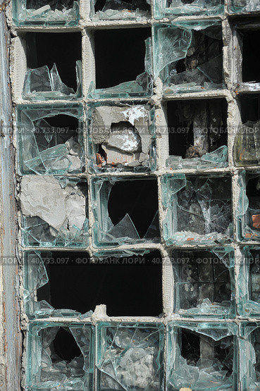 Exterior with broken windows of an old industrial building. Стоковое фото, фотограф Анна Кривицкая / Фотобанк Лори