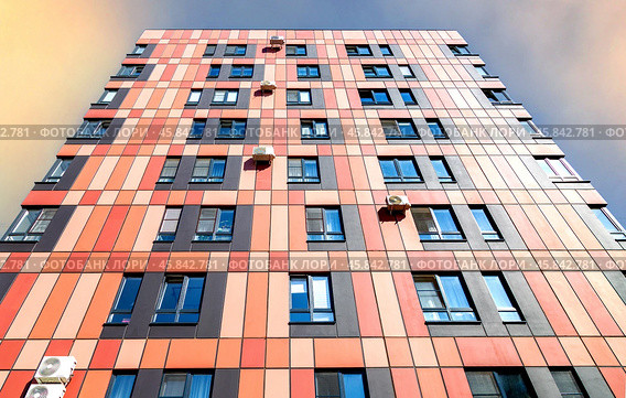 Facade of new bright colorful modern residential building. Стоковое фото, фотограф FotograFF / Фотобанк Лори