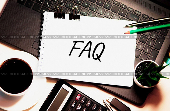 FAQ word is written on white piece of paper. Стоковое фото, агентство Ingram Publishing / Фотобанк Лори