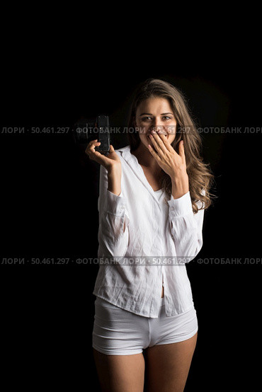 Fashion Portrait of young Woman photographer with camera. Стоковое фото, агентство Ingram Publishing / Фотобанк Лори
