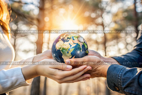 Female and male hands hold a small model of the Earth. Revival. Caring for the planet, ecological awareness and the unity of people in nature conservation. Стоковое AI-изображение, AI-художник Photojuli / Фотобанк Лори