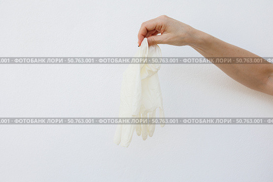 Female hands wearing disposable gloves. Стоковое фото, фотограф Акимова Надежда / Фотобанк Лори