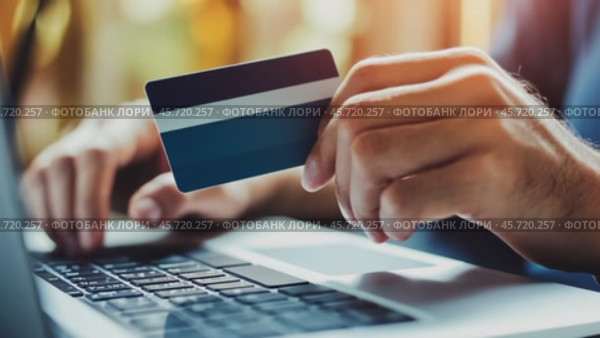 Female Hands with Credit Card close up. Online Shopping Concept. Laptop, Notebook on White Table. Winter Holidays Sale. Digital tablet device. Unrecognizable person sitting at table use online banking. Стоковое AI-видео, аниматор Марина Демидюк / Фотобанк Лори