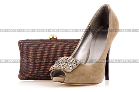 Female shoe and handbag on a white reflective background. Стоковое фото, агентство Ingram Publishing / Фотобанк Лори