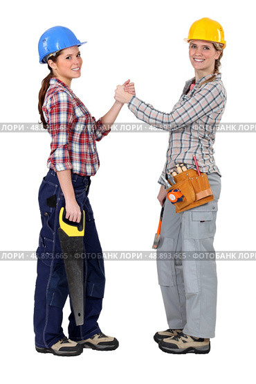 Female workers forming a pact. Стоковое фото, агентство Ingram Publishing / Фотобанк Лори