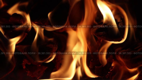 Flame of fire in wood burning fireplace, slow mo. Стоковое видео, видеограф Владимир Григорьев / Фотобанк Лори