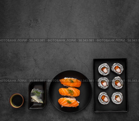 flat lay plates with maki nigiri sushi with copy space. Стоковое фото, агентство Ingram Publishing / Фотобанк Лори