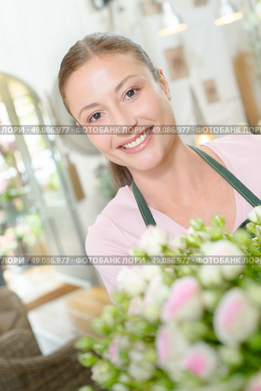 Florist at her work. Стоковое фото, агентство Ingram Publishing / Фотобанк Лори