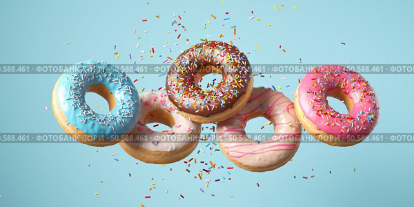 Flying Frosted sprinkled donuts. Set of multicolored doughnuts with sprinkles isolate on color background. 3d rendering. Стоковое фото, агентство Ingram Publishing / Фотобанк Лори