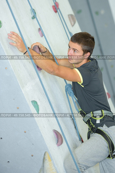 focused wall climber. Стоковое фото, агентство Ingram Publishing / Фотобанк Лори