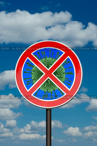 Forbbiden sign with crossed out Coronavirus, Covid-19 molecule on the background of blue cloudy sky. Restriction of air communication between countries. Global calamity. Quarantine concept.. Warning sign with crossed out Coronavirus bacteria. Стоковое фото, агентство Ingram Publishing / Фотобанк Лори