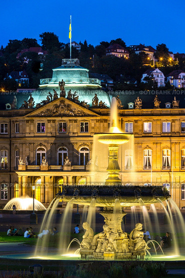 Fountain at neues Schloss New palace in Stuttgart city center, Germany at dusk. Стоковое фото, агентство Ingram Publishing / Фотобанк Лори