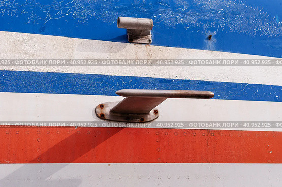 Fragment of the fuselage of a vintage aircraft. Colorful metal texture background with cracked paint. Destruction of a paint and varnish covering from influence of environment. American flag colors. Стоковое фото, фотограф Алексей Игнатов / Фотобанк Лори
