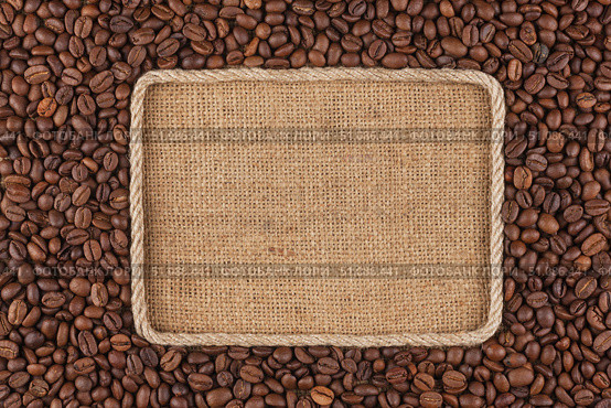 Frame  made of rope with  coffee beans  lying on sacking. Стоковое фото, фотограф Александр Собко / Фотобанк Лори