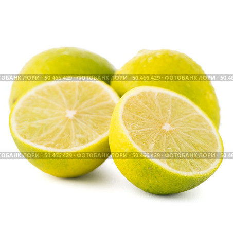Fresh green limes isolated on white background. Стоковое фото, агентство Ingram Publishing / Фотобанк Лори
