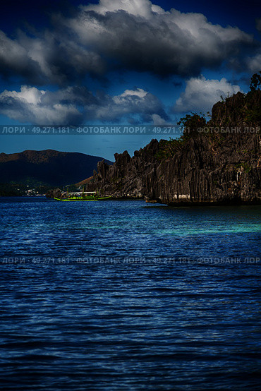from a boat  in  philippines  snake island near el nido palawan beautiful panorama coastline sea and rock . Стоковое фото, агентство Ingram Publishing / Фотобанк Лори
