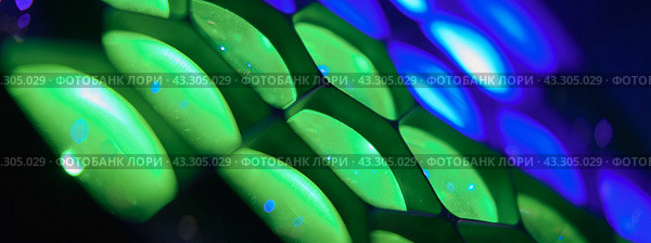Futuristic bright lighting of stage spotlight. Lights on the stage. Photo is suitable for postcard design, template backgrounds, greeting card, posters. Стоковое фото, фотограф YuryKara / Фотобанк Лори