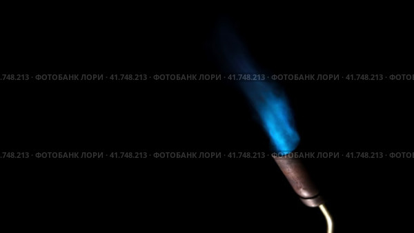 Gas burner flame. Blue fire isolated on black background, close-up. Blue flame switched on from nozzle of gas torch. Flame of manual Butane burner. VFX, Compositing as jet rocket propulsion, spaceship. Стоковое видео, видеограф Марина Демидюк / Фотобанк Лори