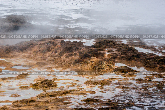Geothermal surface with steam in icelandic nature. Стоковое фото, агентство Ingram Publishing / Фотобанк Лори