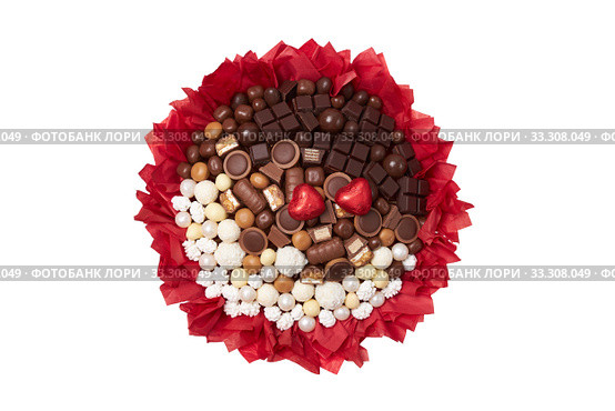 Gift of a beloved girl in the form of a beautiful bouquet of sweets covered with white and dark chocolate. Стоковое фото, фотограф Олег Белов / Фотобанк Лори