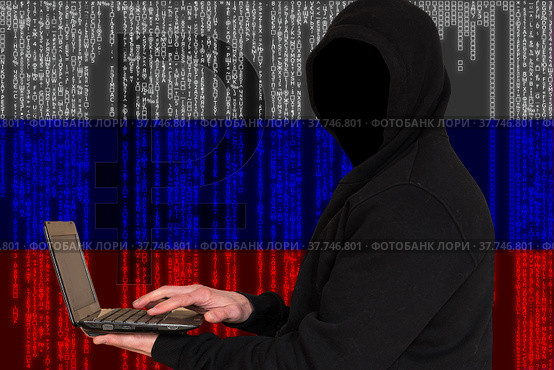Гипотетический хакер в капюшоне на фоне российского флага, сформированного символами в стиле Matrix. Стоковое фото, фотограф Nikolay Pestov / Фотобанк Лори