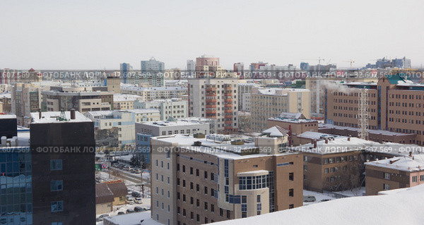Город Якутск зимой. Вид сверху (2019 год). Редакционное фото, фотограф Олег Хархан / Фотобанк Лори