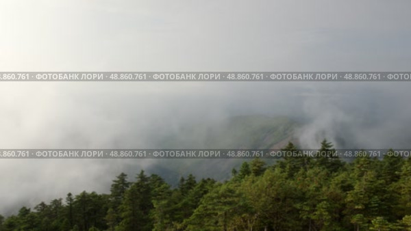 Горы в тумане. Таймлапс. Стоковое видео, видеограф Кузнецов Александр / Фотобанк Лори