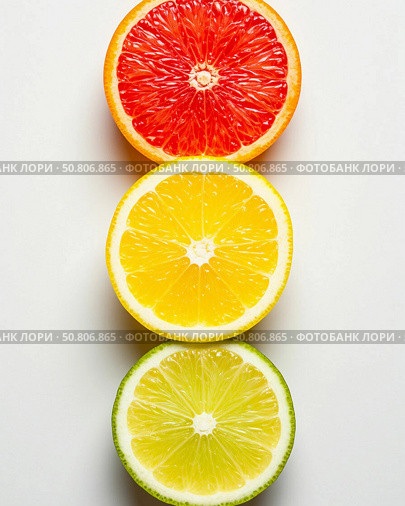 Grapefruit, lemon and lime on white background like traffic light. Стоковое AI-изображение, AI-художник Денис Глагазин / Фотобанк Лори