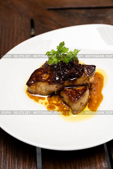 Grilled Foie gras, grilled duck and goose live poultry, with plum savory sauce. Gourmet internationl cuisine recipe using for buffet food and drink concept.. Foie gras. Стоковое фото, агентство Ingram Publishing / Фотобанк Лори