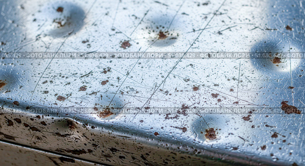 Grunge texture background with old damaged metal surface, abstract industrial wallpaper showing rusty and scratched steel plate with dents for vintage design concept. Стоковое фото, фотограф Павел Муравьев / Фотобанк Лори