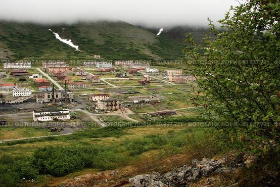 Gudym, Chukotka, Far East Russia - June 30, 2007. The abandoned arctic military town of Gudym in the tundra among the mountains. It was built during the Cold War. Abandoned in 2002. Demolished in 2017. Редакционное фото, фотограф Андрей Степанов / Фотобанк Лори