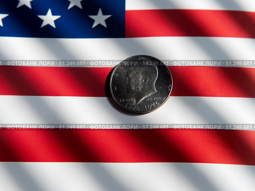 Half Dollar Coin on American Flag Background. Стоковое фото, фотограф Sergakoff / Фотобанк Лори