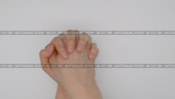 Hand exercises, wrist rotation, joint warm-up. Стоковое видео, видеограф Катерина Белякина / Фотобанк Лори