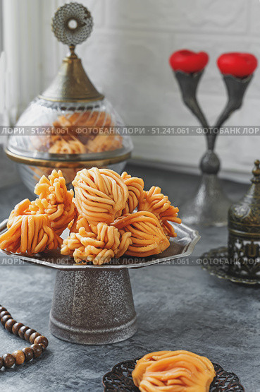 Handmade Muslim holiday sweets chak chak and nath. Homemade Muslim sweet pastries close-up. Стоковое фото, фотограф Оксана Медведева / Фотобанк Лори