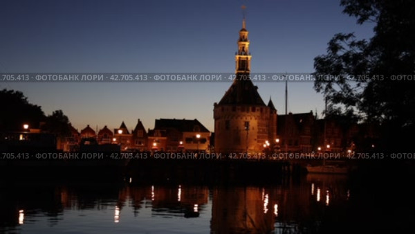 Harbour of Hoorn with sailboats at evening and the Hoofdtoren. Hoorn is harbor town at the Markermeer dating back to the 12th century, Hoorn, Netherlands. Стоковое видео, видеограф Яков Филимонов / Фотобанк Лори