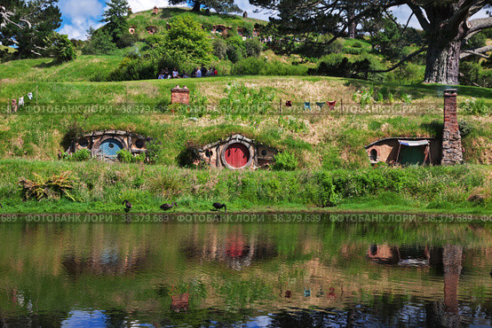 Hobbiton, New Zealand - 15 Dec 2018. Hobbiton is theme Park in New Zealand. Редакционное фото, фотограф Сергей Стрелков / Фотобанк Лори