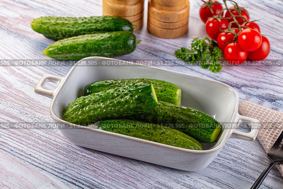 Homemade lightly salted cucumbers snack. Стоковое фото, фотограф Андрей Старостин / Фотобанк Лори
